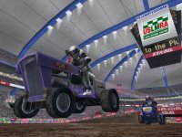 260546-lawnmower-racing-mania-2007-windows-screenshot-taking-a-jump.jpg